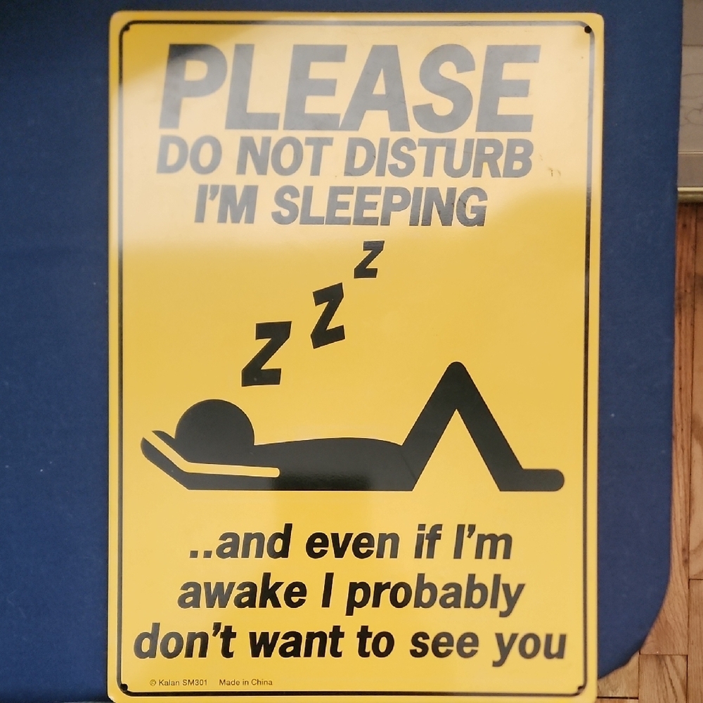 Yellow 'Do Not Disturb' Sign